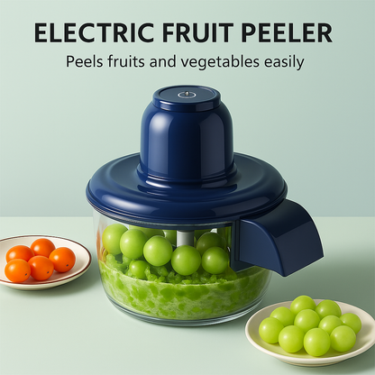 Electric fruit peeler with peeled grapes and tomatoes on a light green background