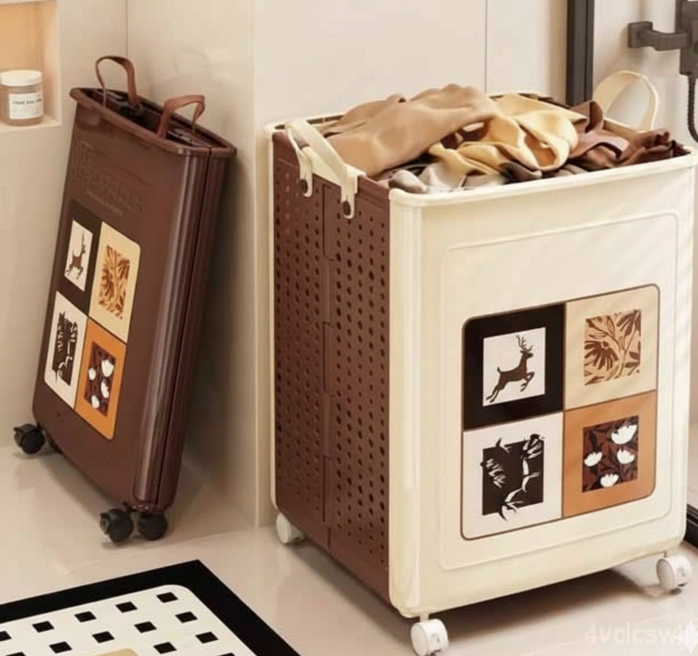 Two laundry baskets, one brown and one white with decorative patterns, on a tiled floor.
